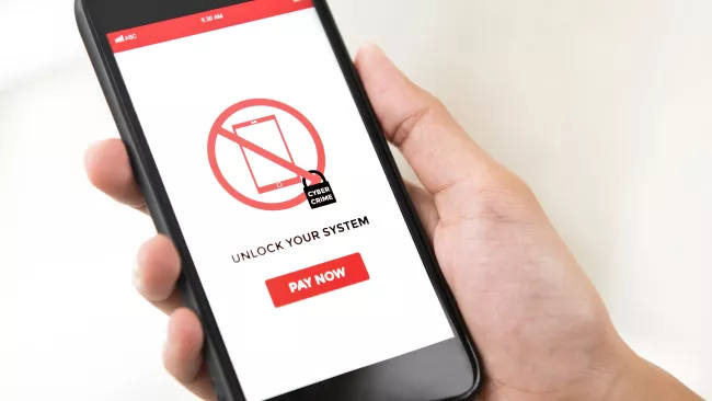 Malicious COVID-19 tracker app locks phones